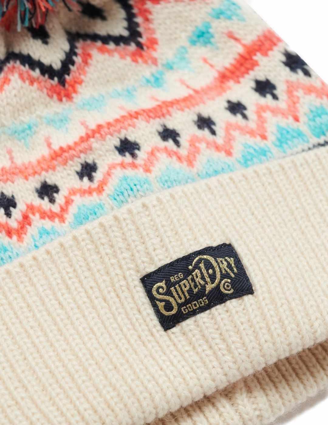 Gorro Superdry estampado beige de lana con pompón para mujer