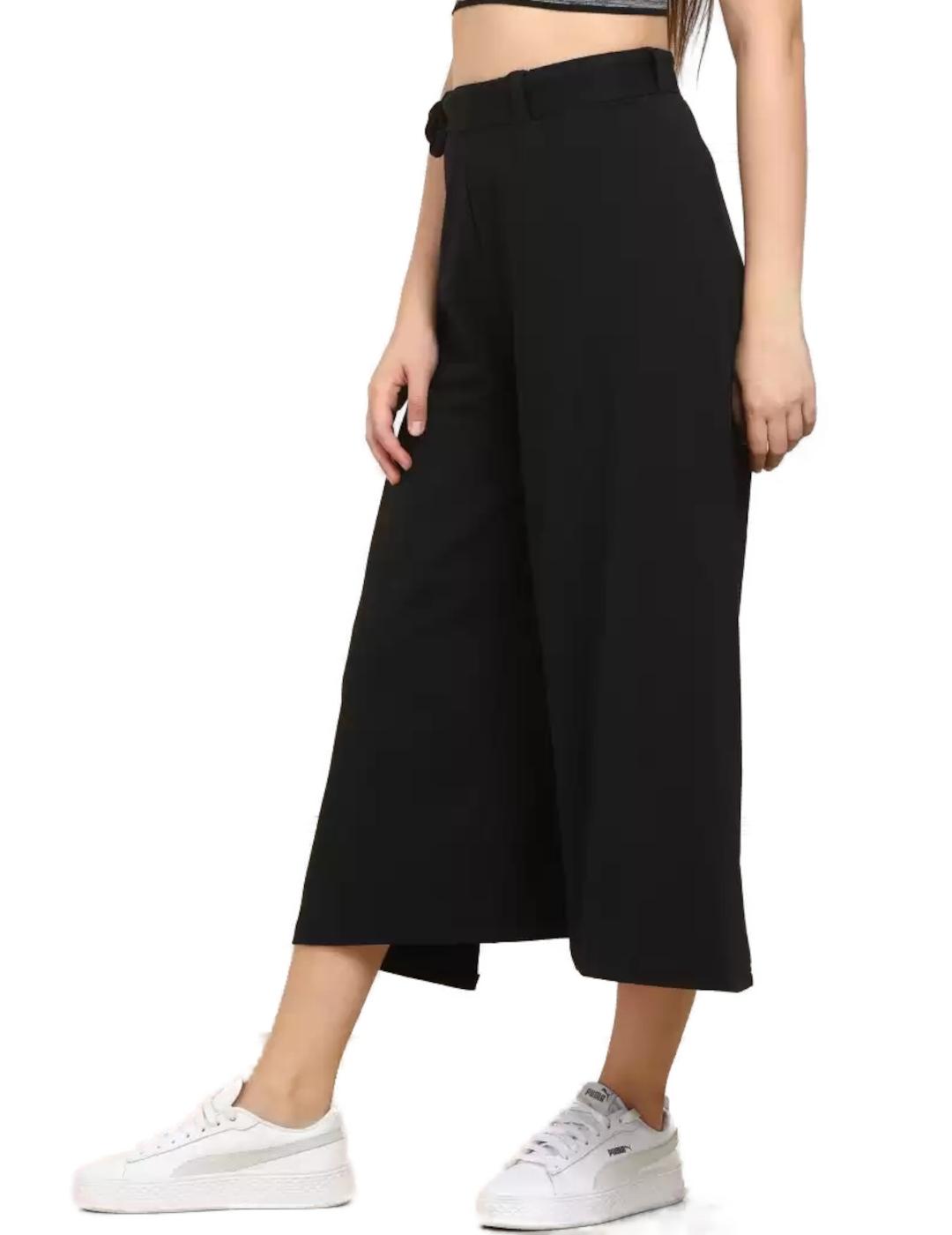 Pantalón Puma Evo Aikido negro anchos y tobilleros de mujer