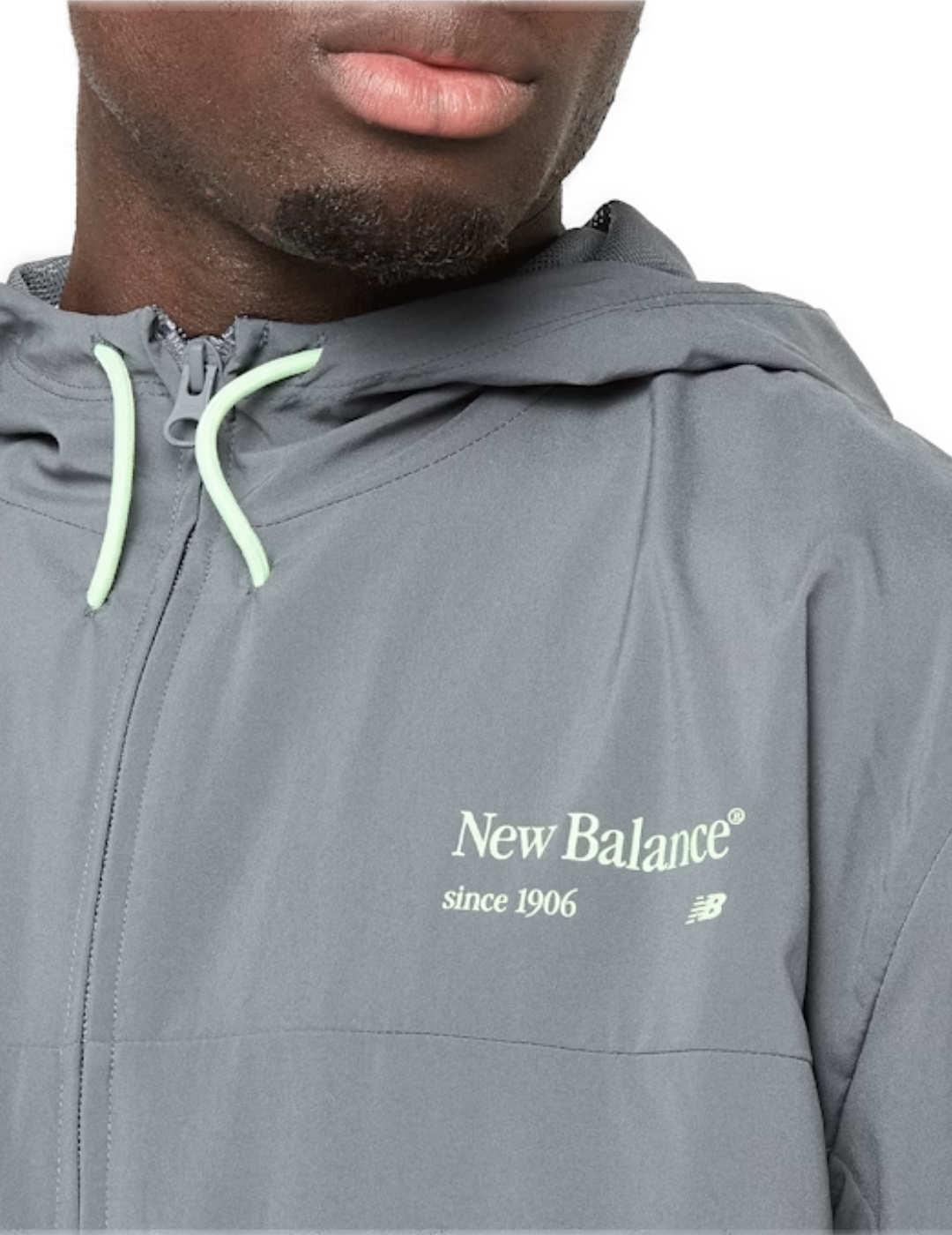 Chaqueta New Balance gris tejido técnico para hombre