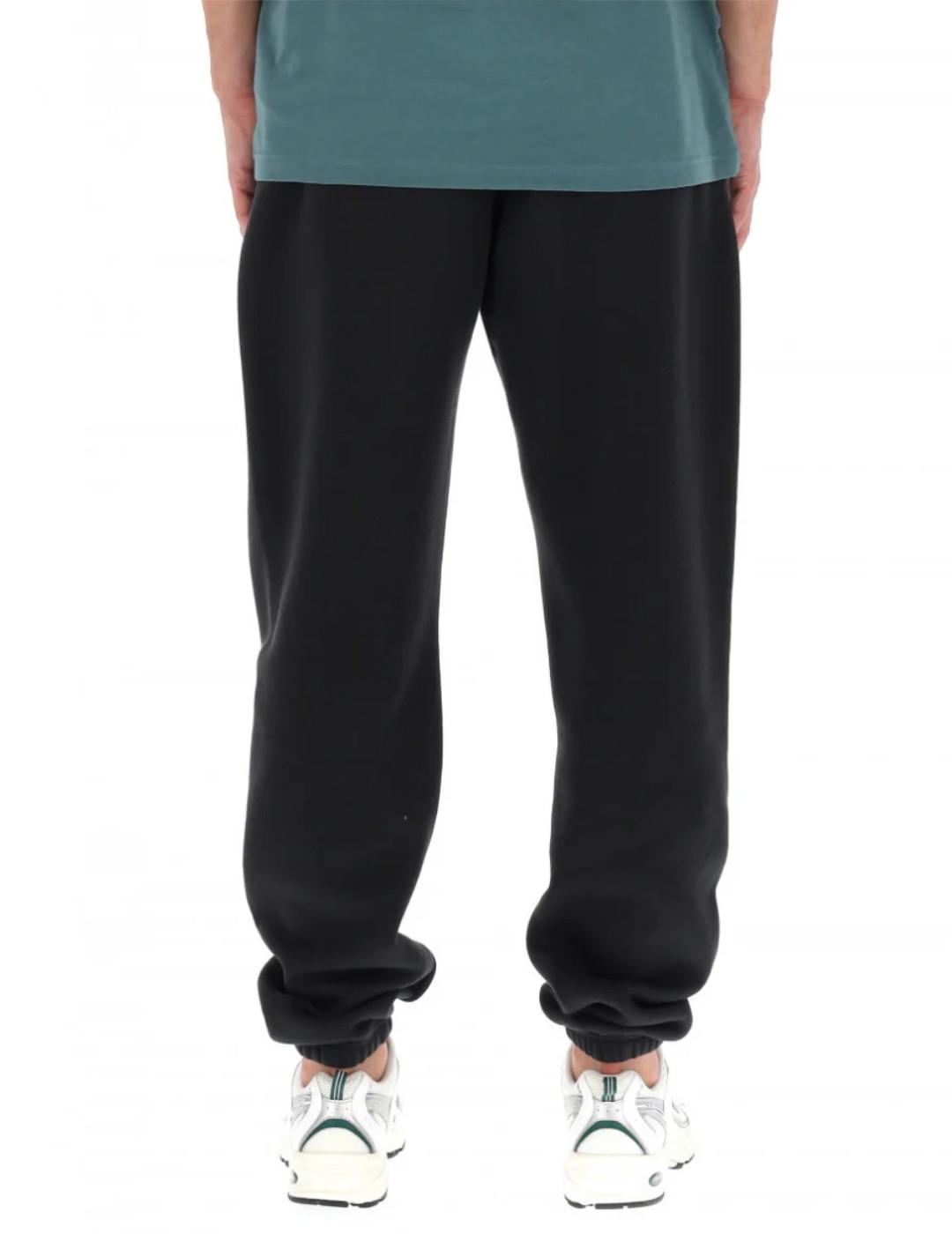 Pantalón New Balance jogger negro afelpado para hombre