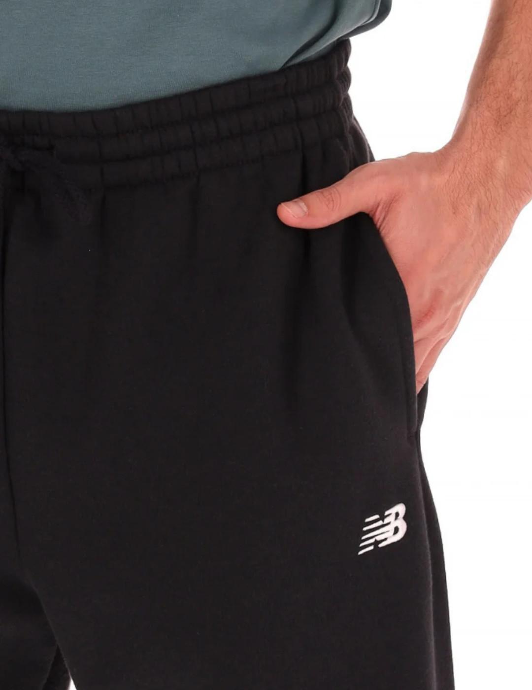 Pantalón New Balance jogger negro afelpado para hombre