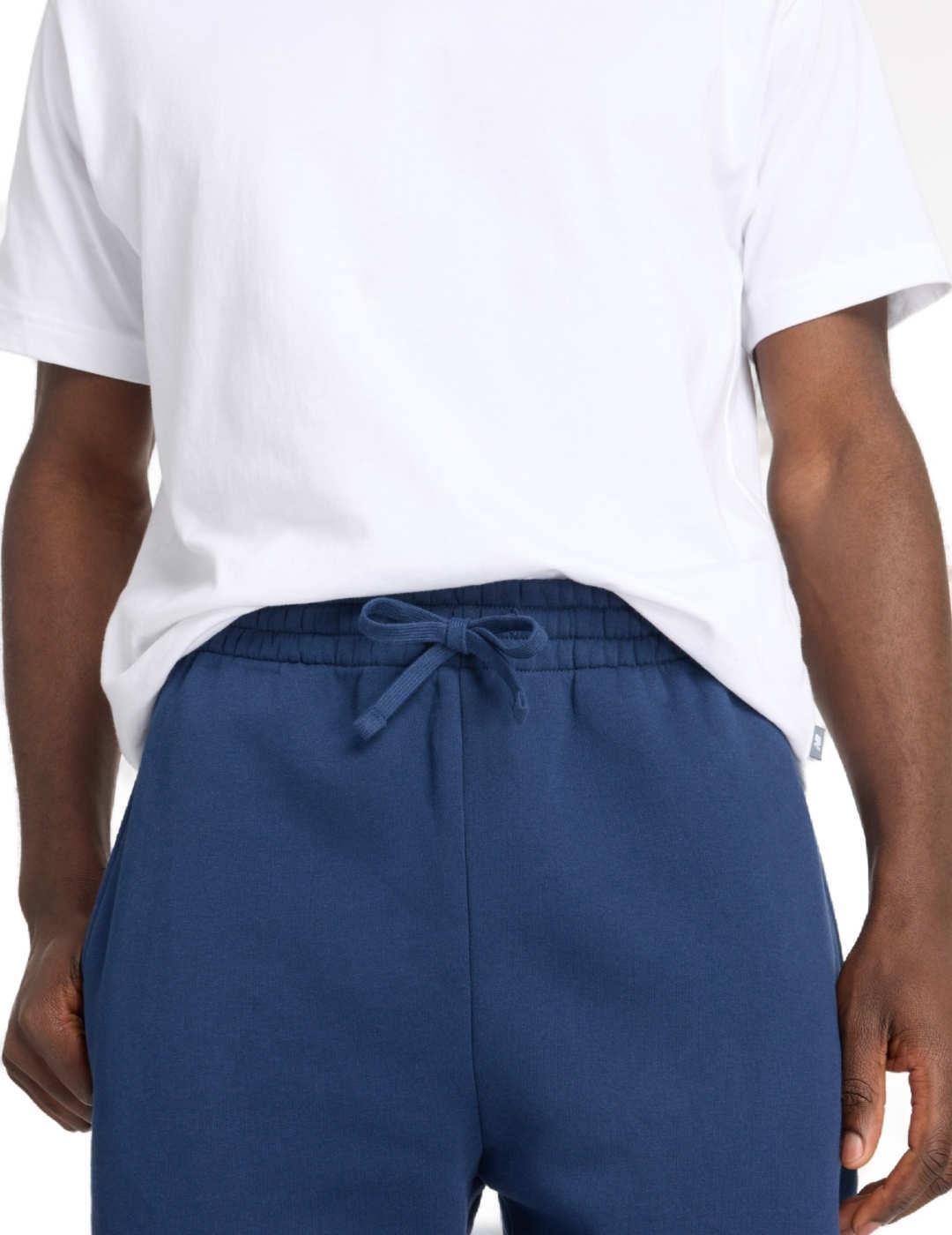 Pantalón New Balance jogger marino afelpado para hombre