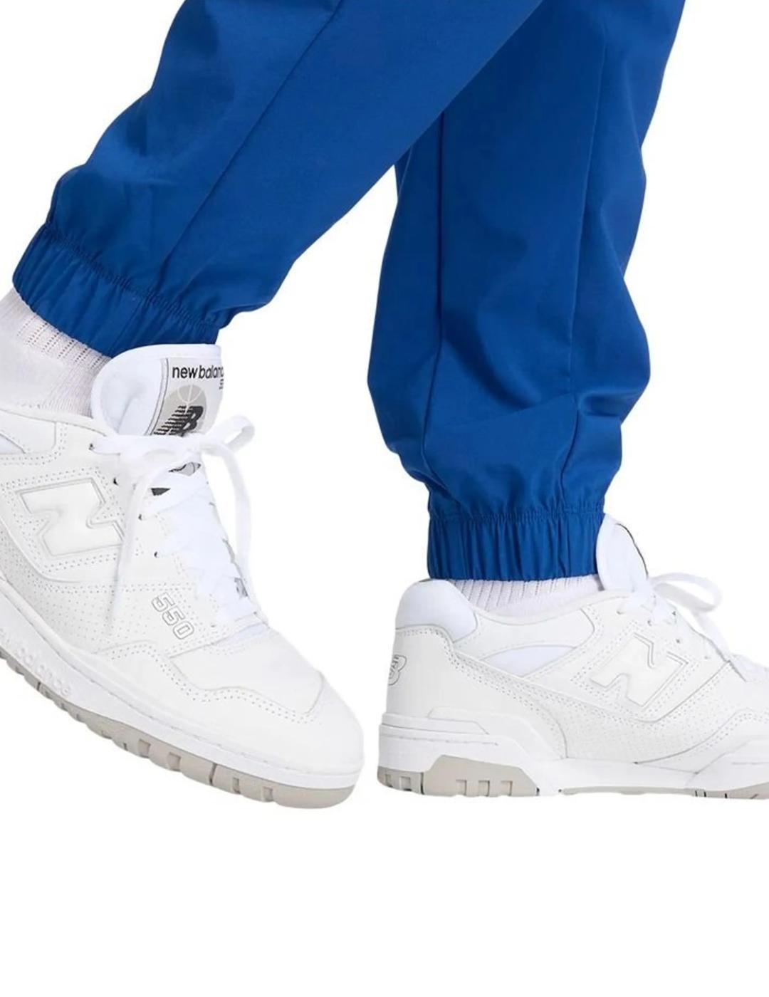 Pantalón New Balance jogger azul tejido técnico de hombre