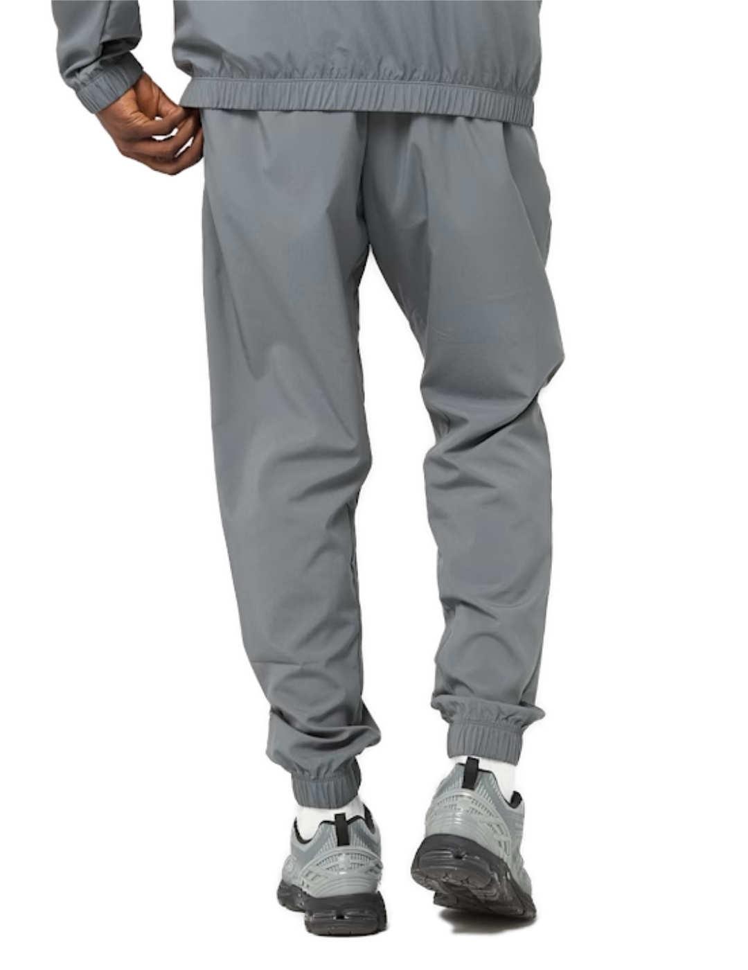 Pantalón New Balance jogger gris tejido técnico para hombre